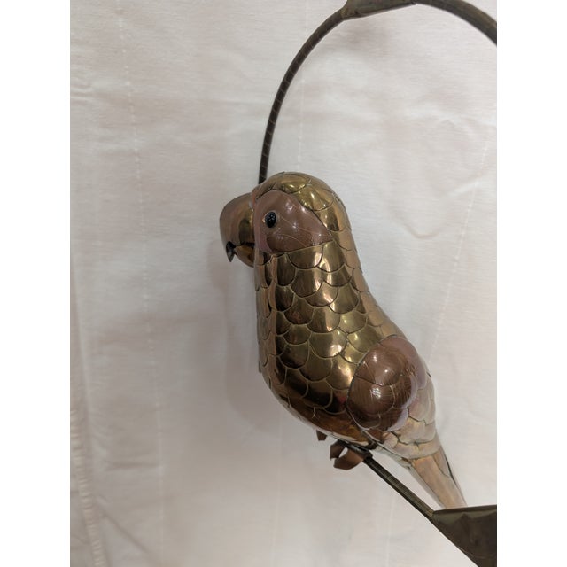 Mixed metal parrot perched on metal ring in Sergio Bustamante style. This unsigned peice has mild tarnish, but great...