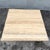 This Italian travertine coffee table showcases the natural beauty of stone with a softly sculpted bullnose edge. The...