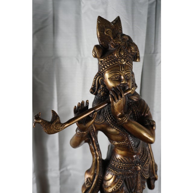 Bring timeless elegance and spiritual symbolism into your home with this striking vintage bronze sculpture depicting...
