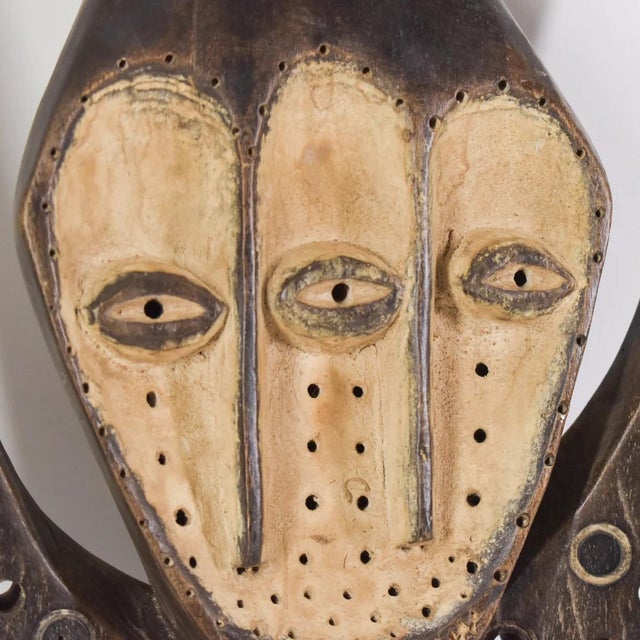Lega art, originating from the Lega people in the Democratic Republic of the Congo, is known for its unique and stylized...