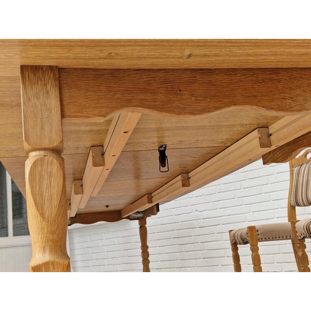 1970s, danish design. Dinning set of unfolded table and four chairs. Oak wood, chair seats reupholstered in furniture...