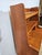 Beautiful Danish secretary's desk from the 1960s. The structure is covered with teak veneer. The legs are made of solid...
