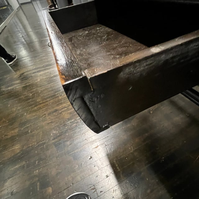 Beautiful Chinese colonial style black lacquer desk that has two "S" shaped legs that cross each other (a sort of...