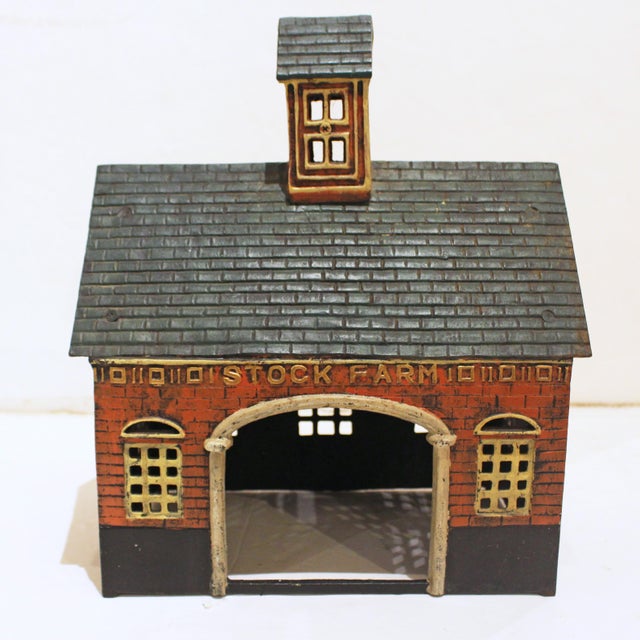 Cast Iron "Stock Farm" Barn & Animals, American, mid-20th century. Animals: horse, cow, pig, ram & rooster. Very good...