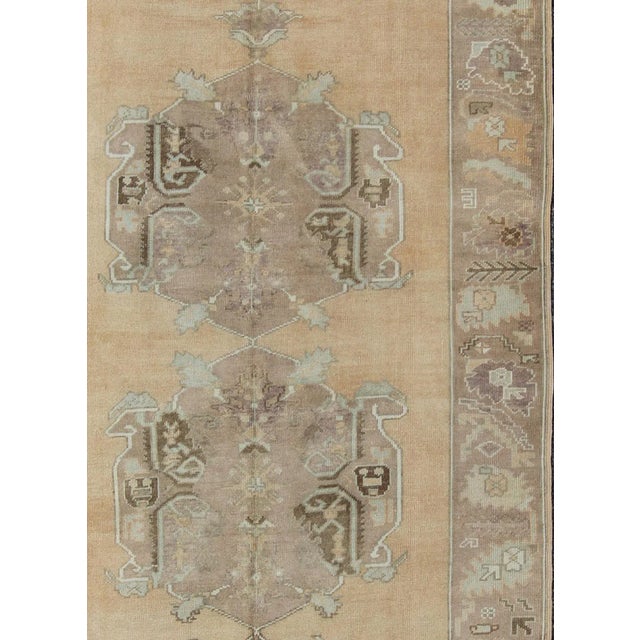 Measures: 5'4 x 10'8. Vintage Turkish Oushak Gallery Rug in Soft Camel, Taupe, and Muted Blue Tones. Keivan Woven Arts /...