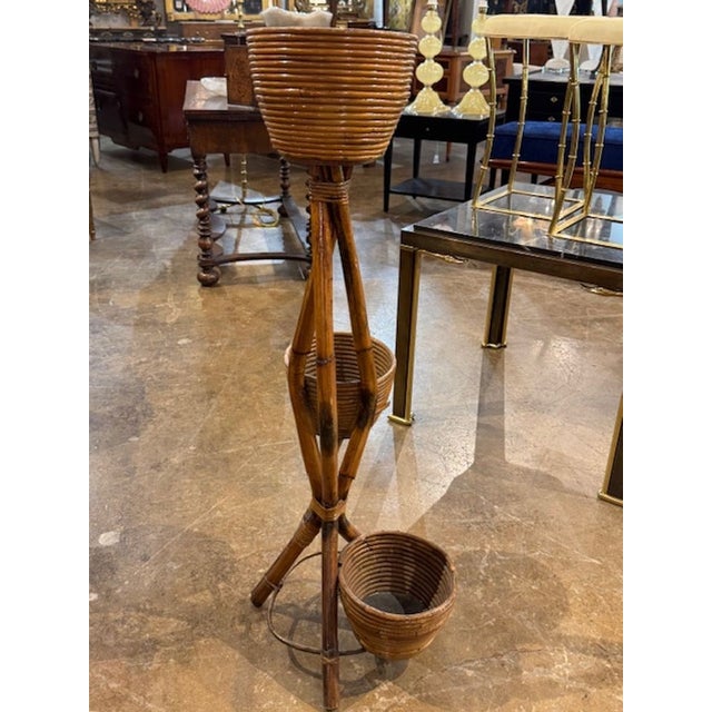 Vintage Italian bamboo 3-tier planter. You're drawn to a sleek fusion of mid-century modern glamour and Italian...