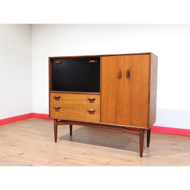 A beautiful versatile piece of furniture, this Mid Century Modern Vintage TeakHutch by G Plan offers great storage and can...