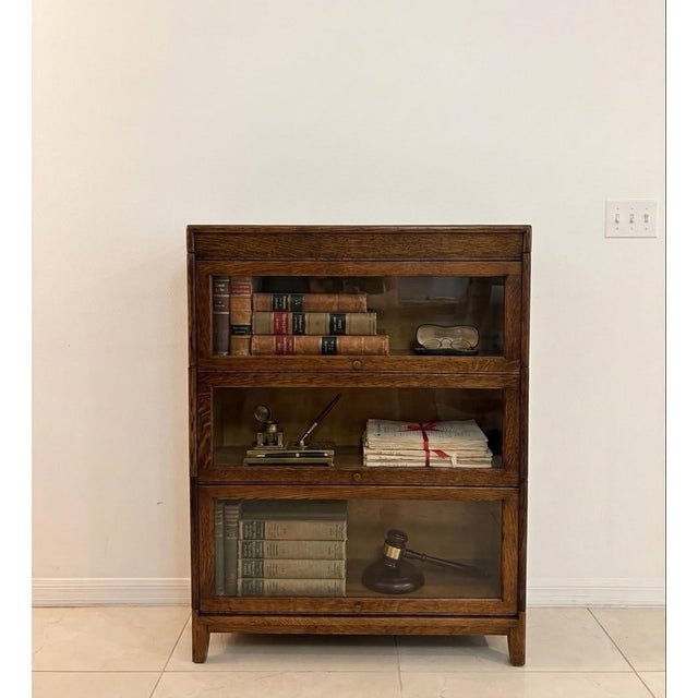 Authentic 3-tier modular stacking barrister made of solid quartersawn white oak with dramatic tiger grain patterning....