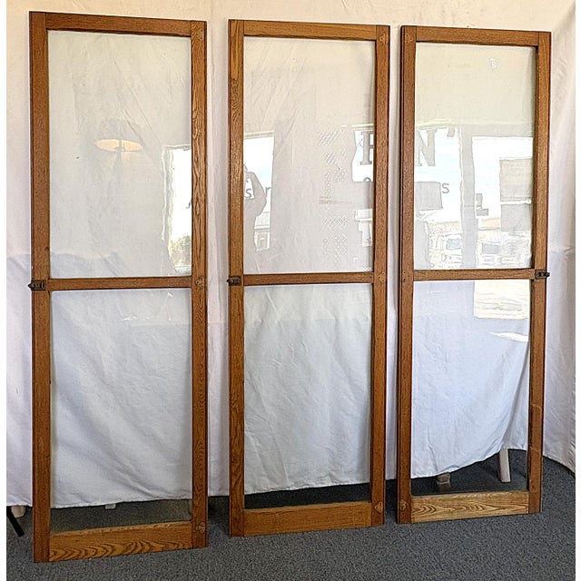 Great set of three architectural salvage interior doors from the mid 20th century. They are made of oak with horizontal...