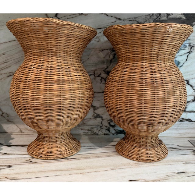 Pair of oversized vintage rattan vases/urns/jar featuring sculptural hourglass silhouettes, beautifully handwoven natural...