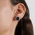 These Art Deco-style octagon-cut blue sapphire & diamond halo stud earrings feature striking 8.3 carats of octagon-cut...