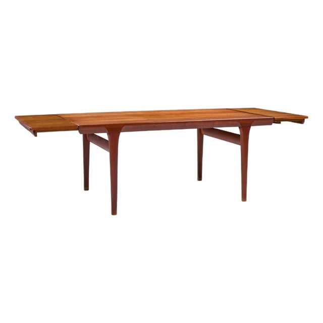 Kofod Larsen for Faarup Møbelfabrik Mid Century Teak Hidden Leaf Expanding Dining Table For Sale