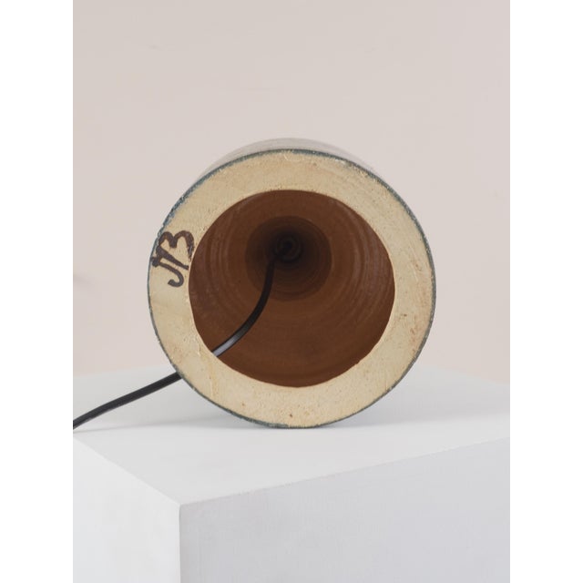 Scandinavian work table lamp sweden, circa 1960 ceramic signed under the base (signature to be identified) h: 26 cm / d:...