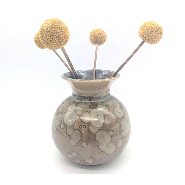 Offered is a studio pottery bud vase with a unique crystalline glaze on the stoneware signed and dated on the bottom...