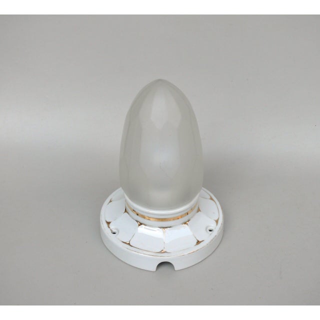 An elegant, delicate ceiling light from the Art Nouveau period, made by Brunnquell, Germany. The base is made of white...