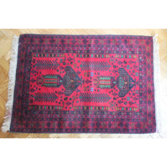 This piece is believed to be produced in the 1960's, most likely in Afghanistan. It is an oriental rug with distinct...