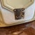 A Vintage Louis Vuitton Beige and White Leather Cruise Hand-Bag For Sale - Image 16 of 18