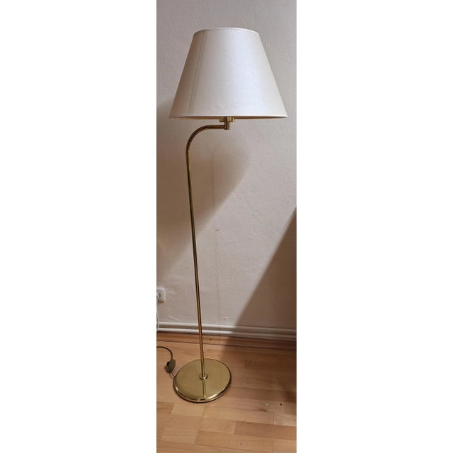 Vintage Floor Lamp with Brass Frame and Cream-Colored Fabric Shade, 1980s, in Good conditions. Designed 1980 to 1989...