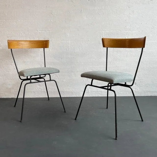 This pair of 1535 side chairs were designed by beloved American furniture designer Paul McCobb as part of his Planner...