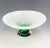 This is a great white and green art glass pedestal bowl. The beautiful bowl is hand-blown white glass with a green color...