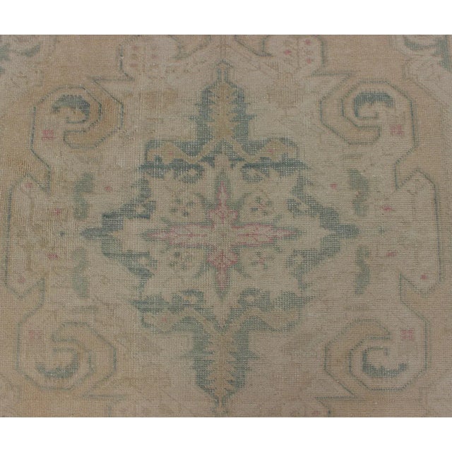 Alabaster Vintage Oushak Rug From Turkey With Muted Colors and Floral Medallion For Sale - Image 8 of 11