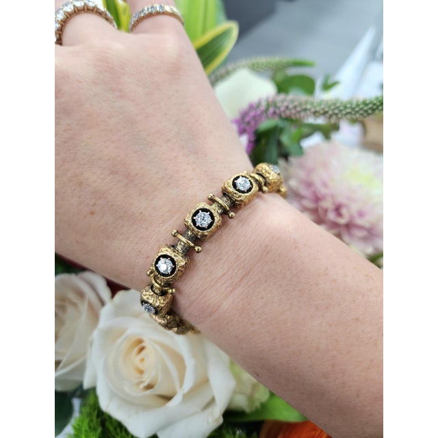 We offer free 2-day shipping! Victorian meets Brutalist Era! This one-of-a-kind vintage 14K gold bracelet features a...