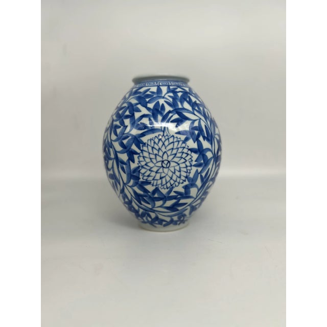 Vintage Japanese Blue and White Floral Bamboo Decorated Vase, signed to underside from the Matsuiwa region of Japan.