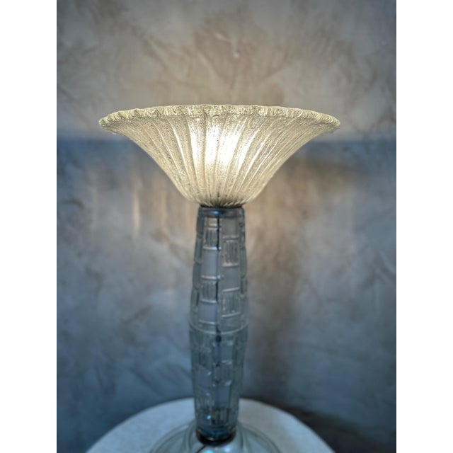Large Murano glass lamp dating from the 1950s, remarkable for its generous dimensions and the combination of three...