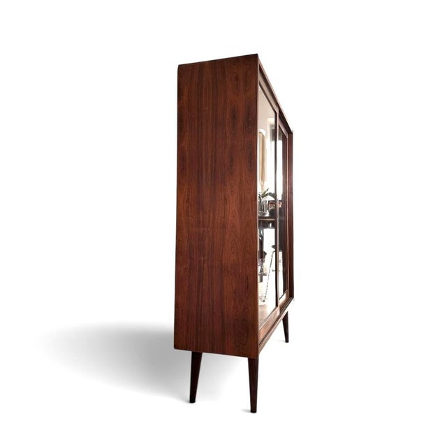 Elegant mid-century vitrine with warm patina and practical proportions rare danish display cabinet in rosewood, dating...