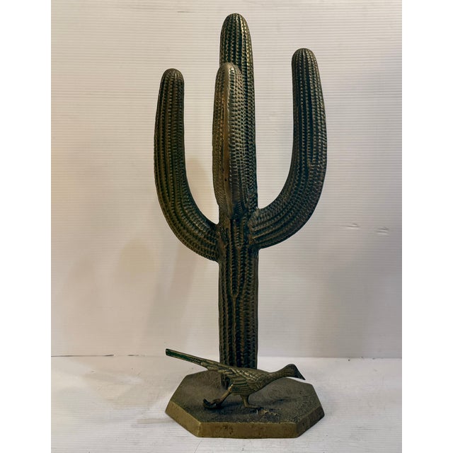 This large brass statue is in the style of Alain Chervet, it features a saguaro cactus and the iconic roadrunner. This...
