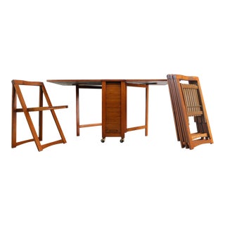 1960s Danish Modern Drop Leaf Hide a Way Table With 4 Folding Chairs - 5 Pieces For Sale