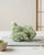 A quiet natural Prehnite specimen selected for its soft botanical green tone, botryoidal crystal formation, and compact...