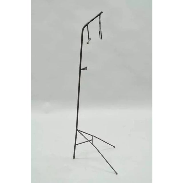 Vintage Modernist Jacques Adnet Style French Wrought Iron Hairpin Clothing Valet. Item features brass ball ends on the...