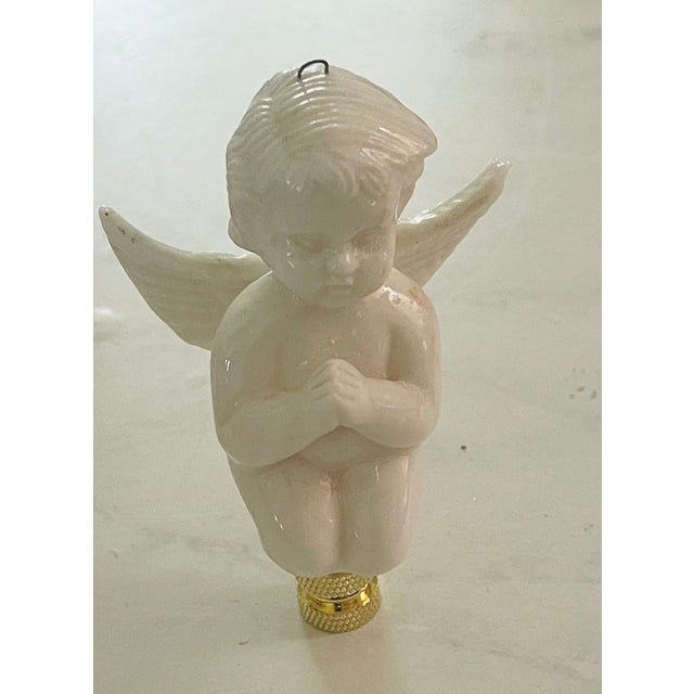 Charming vintage glazed ceramic praying angel Figurine.