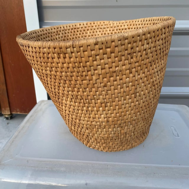 Base measures 7.5 inches in diameter. Woven Seagrass basket in good condition. Perfect as a wastebasket or to hold a...