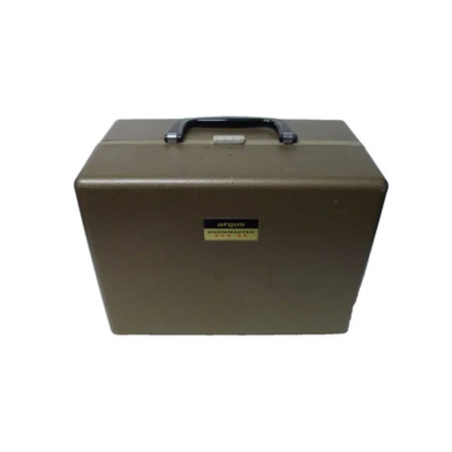 FREE SHIPPINGStep back in time with the Argus Showmaster 500-AZ movie projector, a vintage treasure that brings the magic...