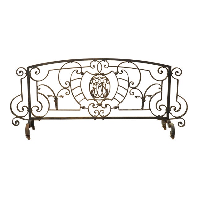 A Long, Wrought Iron French Fireplace Grille With Central Monogram, Circa 1890 For Sale