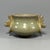 A vintage‑style Chinese Longquan celadon censer, featuring two dragon‑shaped side handles. The surface has natural...