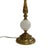 Elegant vintage table lamp featuring a substantial solid brass construction paired with a frosted white glass orb accent....