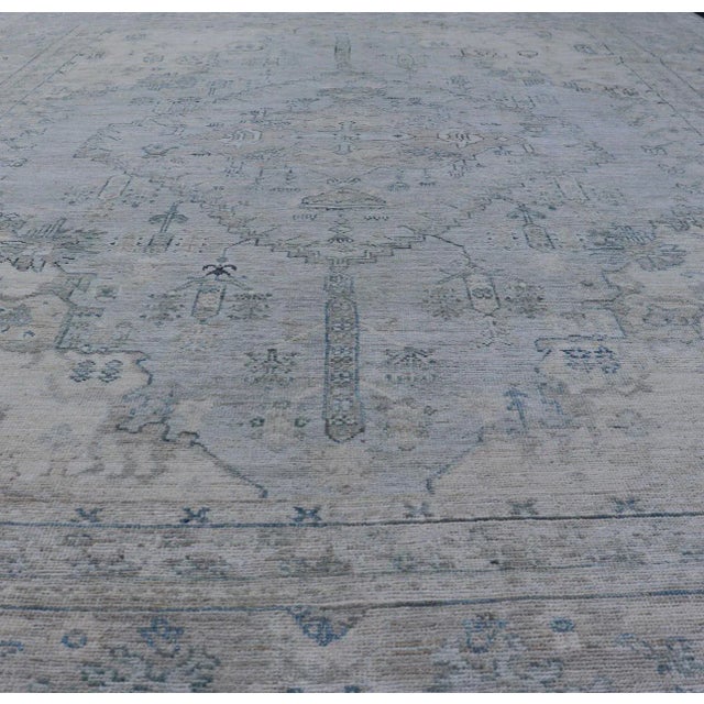 Tribal Modern Designed Rug With a Light Blue Background and Tribal Medallion Motifs For Sale - Image 3 of 12