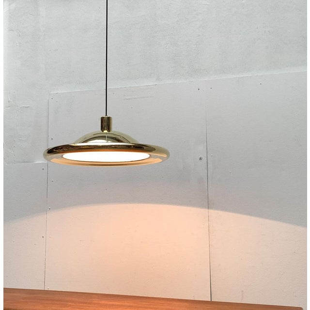 Imposing ufo pendant lamp from the italian manufacturer luci from the 1970s. A rare model by luci italia that is hard to...