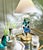 This is a hand made cloche lamp with real butterflies inside. The base is made of wood, gold leafed with brass feet and a...