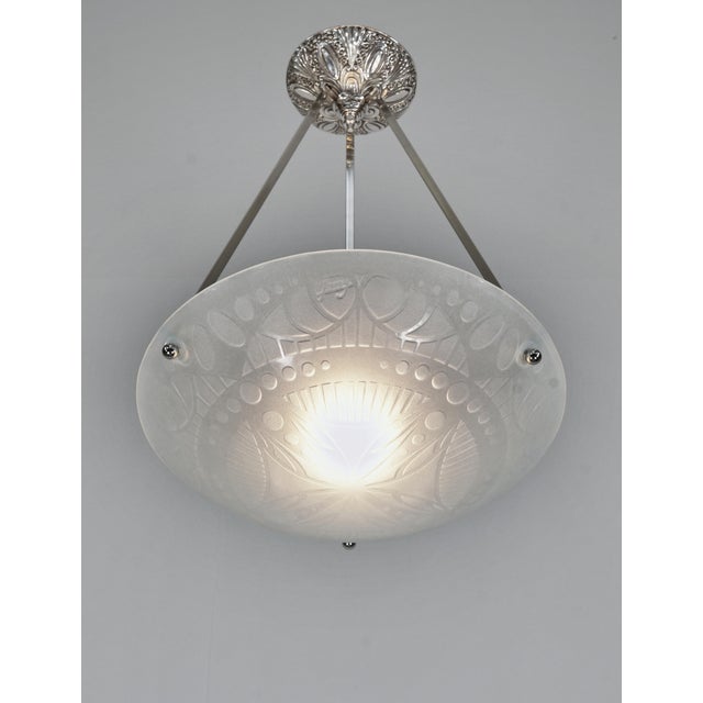Jany A very rare French 1925-1930 art deco pendant in nickel plated solid brass or bronze. Note the mounting with its...