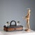 Inkwell with a partially ebonized wooden paper drawer, featuring shaped glass vials and bronze lids. Curved handle and...