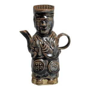 Republic-Era Chinese Figural Dispenser in the Form of a Taoist Immortal