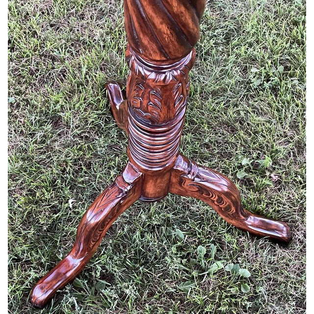 56” Beautiful Victorian mahogany pedestal fern stand featuring a bold barley twist mid section flanked top and bottom with...