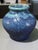 This vintage art pottery blue glazed vase features a mid-century modern style, with a glossy finish and a beautiful blue...