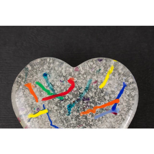 Celebrate a loved one with this vintage confetti heart of glass paperweight. Has a variety of color strands encased in...