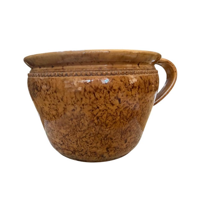 A 1920s Meissen speckle-glazed stoneware pot — stamped Meissen, a charming European piece. Measures 9"W x 6.5"D x 11"H. A...