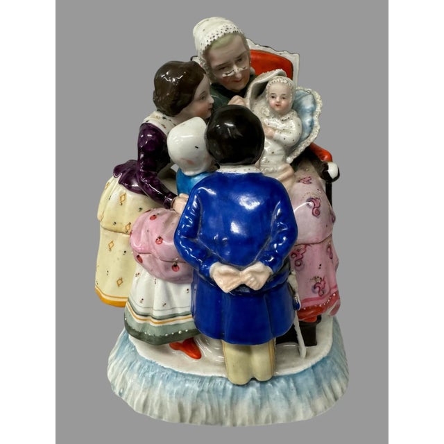 Antique Staffordshire Porcelain Figural Inkwell of a Grandmother with Children In original condition showing some typical...
